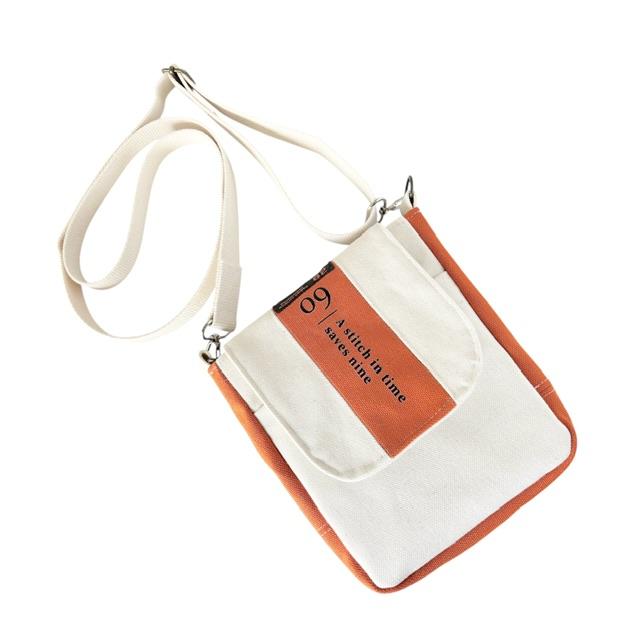 オレンジ＋生成り帆布のフラップポシェット